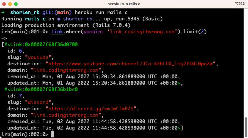terminal window running a Rails console with two Link records shown, which each define a domain, slug, and destination